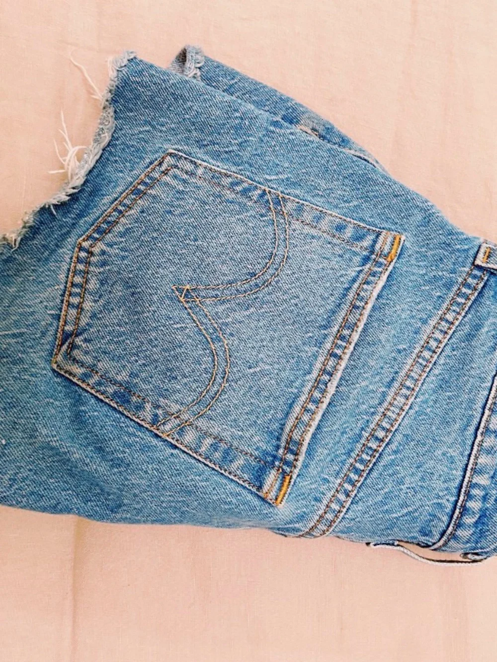 Levi's Light Blue Denim Cutoff Shorts with Frayed Hem